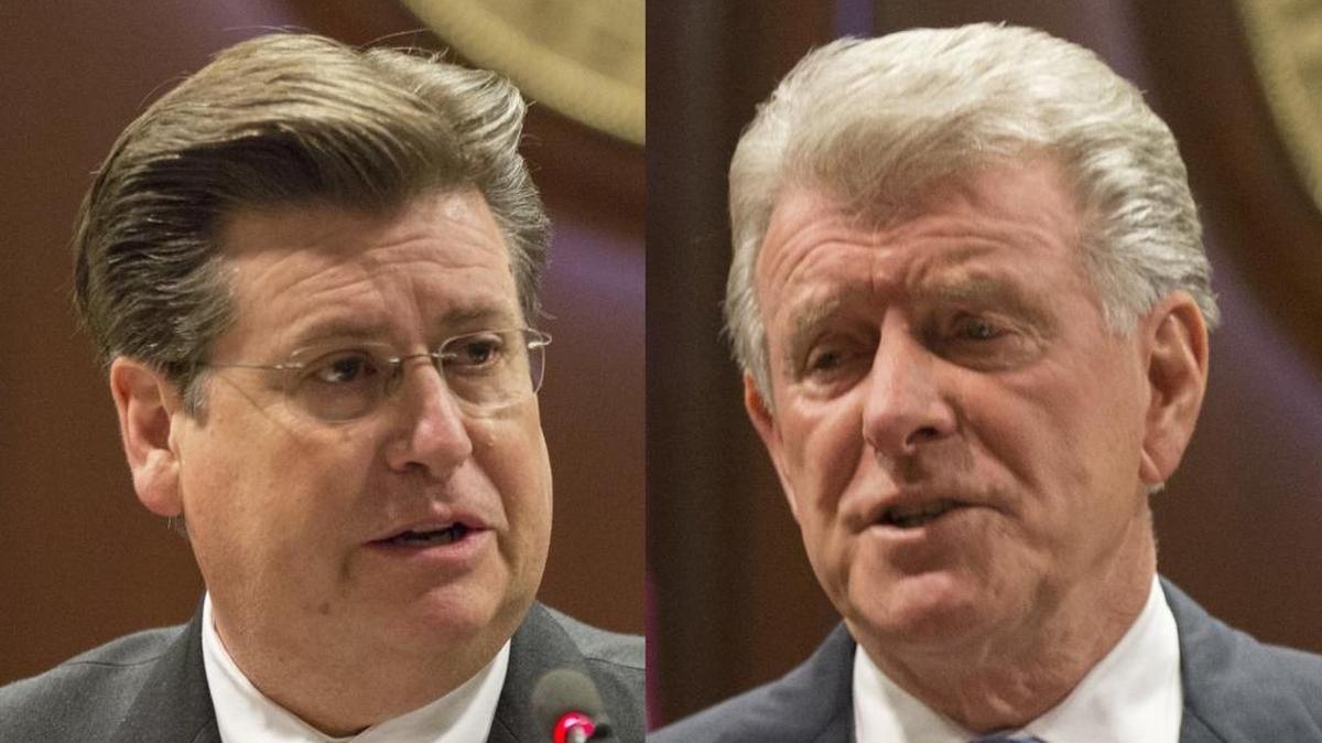 Idaho Gov. Butch Otter, right, and state Insurance Director Dean Cameron.