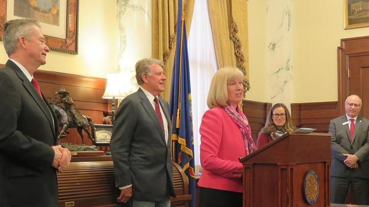 Sen. Mary Souza, R-Coeur d'Alene, speaks at a ceremony in Gov. Butch Otter's office on March 28, 2018, celebrating new youth suicide prevention training legislation. At left is Lt. Gov. Brad Little; at center, Otter; and at right, Sen. Fred Martin, R-Boise.