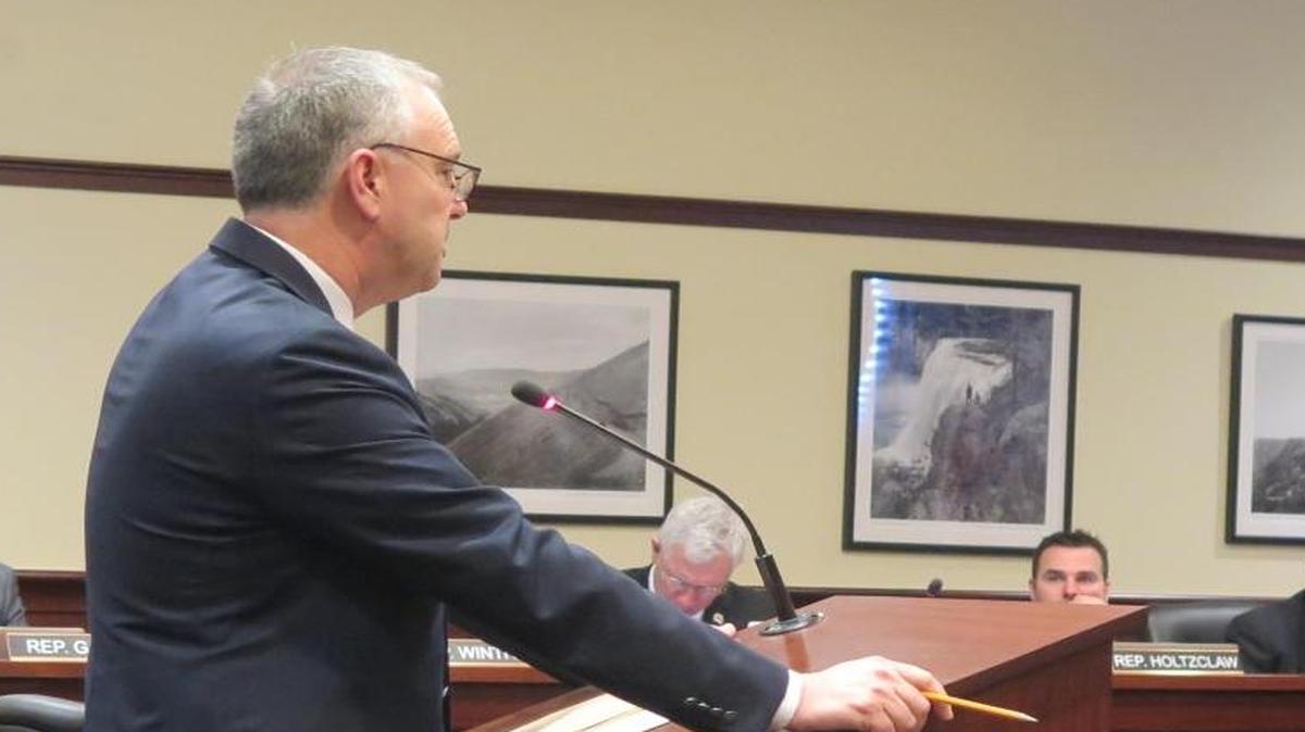Rep. Joe Palmer, chairman of the House Transportation Committee, argues Tuesday for his legislation that would shift funding from the Idaho State Police to state roads.