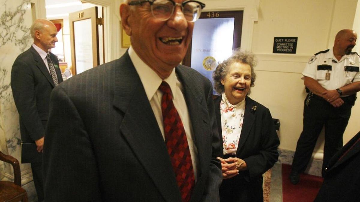 Mark Ricks shares a laugh with his wife, Evelyn, outside the committee room where his nomination as lieutenant govenor was being debated in 2006.