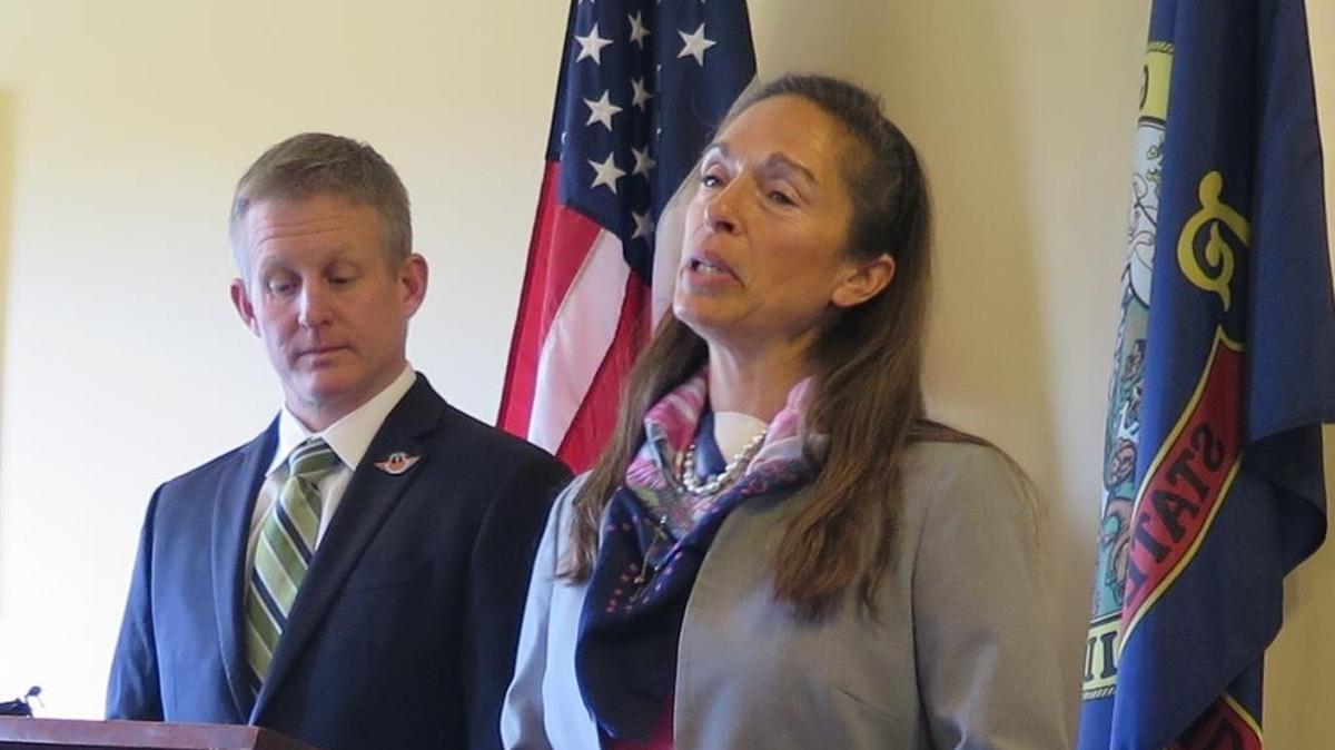 Senate Minority Leader Michelle Stennett, right, and House Minority Leader Mat Erpelding, left, discuss this year's legislative session on March 28, 2018.