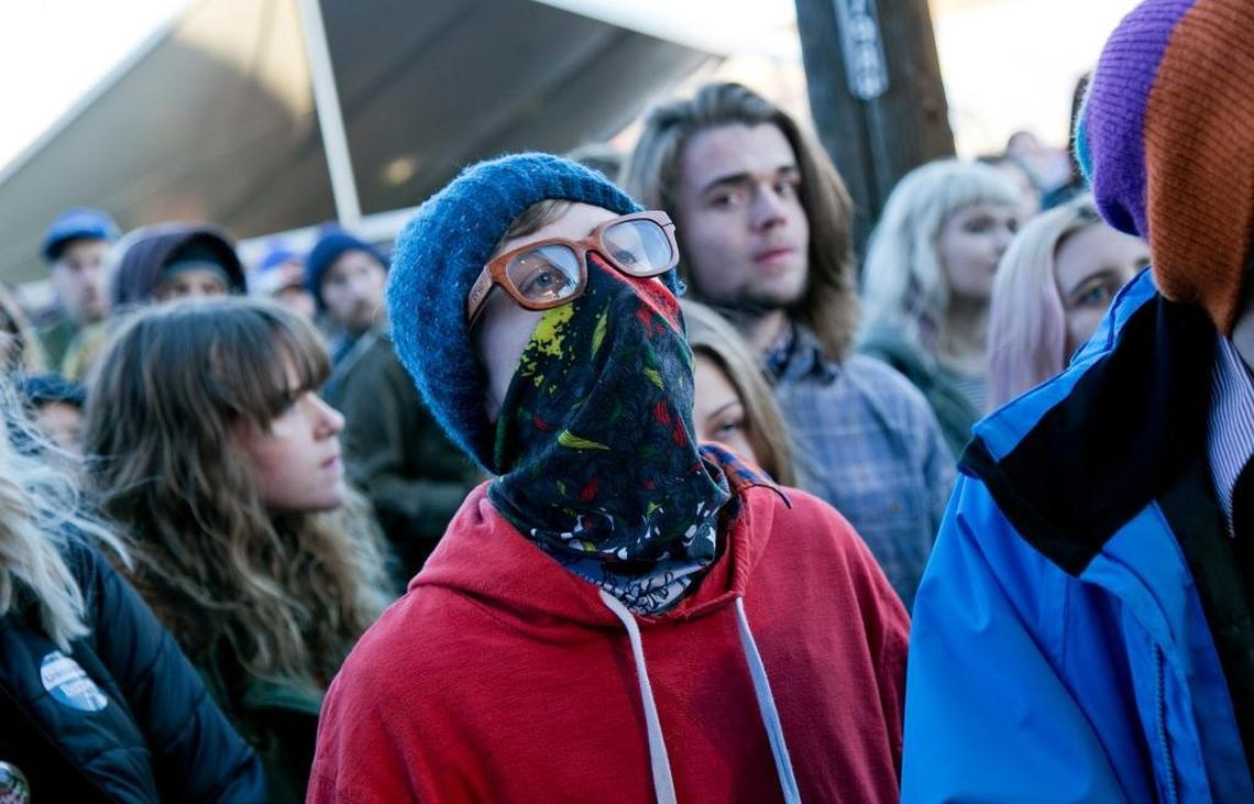A fan covers up against the chilly weather during a 2016 performance at Treefort Music Festival in Boise.