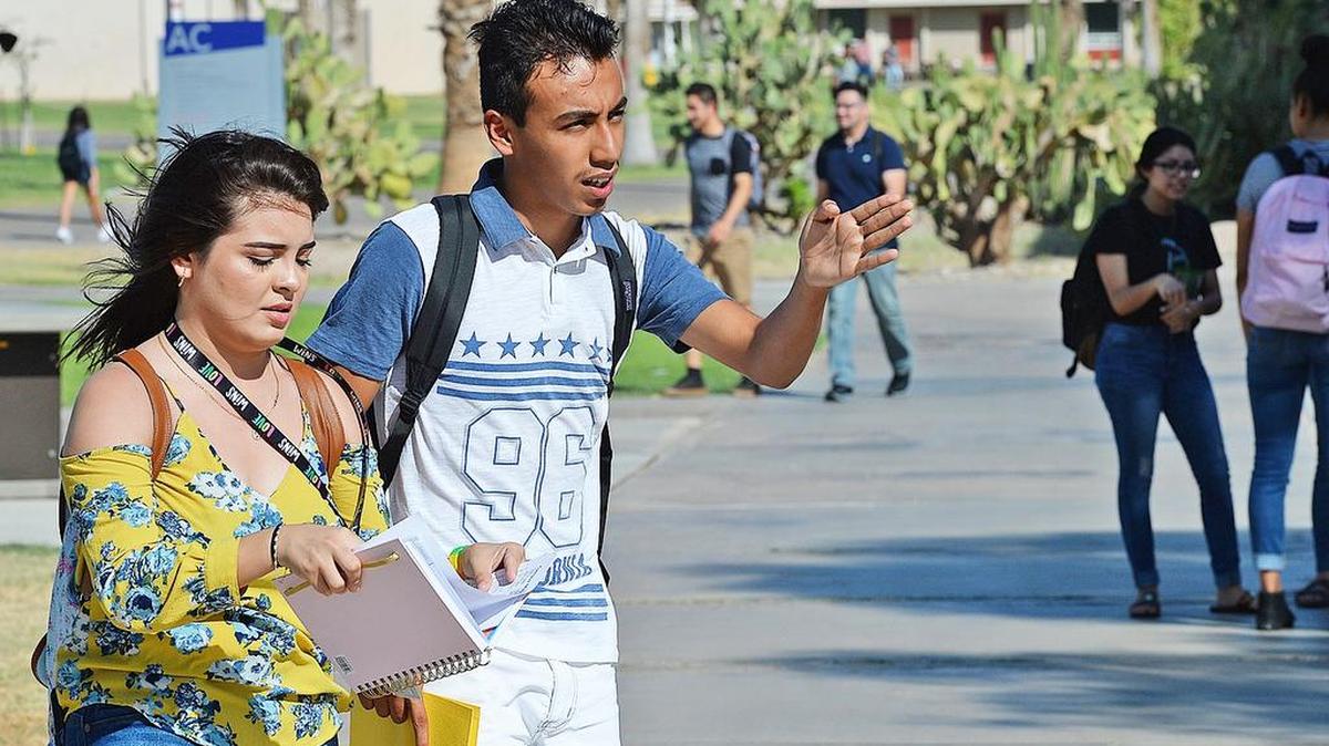 Students navigate the Arizona Western College main campus Monday, Aug. 20, 2018, in Yuma, Ariz., on the first day of the fall semester.