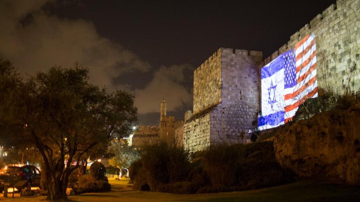 The Israeli and American flags are projected on the walls of the Old City of Jerusalem Wednesday. President Donald Trump upended nearly seven decades of American policy by recognizing Jerusalem as the capital of Israel.