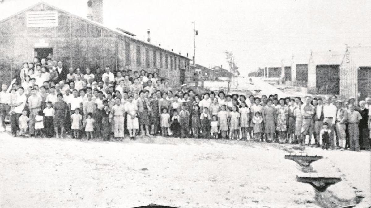 Residents turn out for photo: Minidoka Relocation Center, where thousands of people of Japanese ancestry were forced to stay during WWII, is seen here as it appeared when occupied.