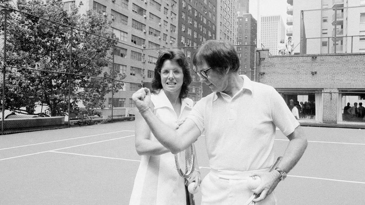 Wimbledon champion Billie Jean King checks the muscles on her nemesis, Bobby Riggs, in New York in 1973. The story of the early days of the women’s tennis tour and King’s fight for equal prize money is chronicled in the movie “Battle of the Sexes.”