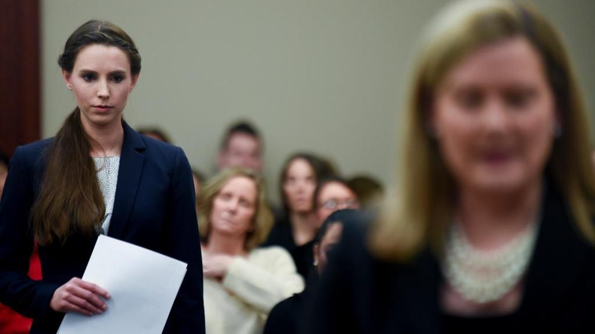 Rachael Denhollander, left, is introduced by Assistant Attorney General Angela Povaliatis, before she makes the final victim-impact statement at Larry Nassar's sentencing hearing Wednesday