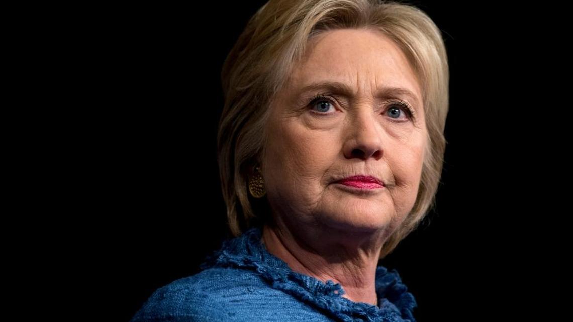 Democratic presidential candidate Hillary Clinton pauses as she speaks during an election night event at the Palm Beach County Convention Center in West Palm Beach, Fla., Tuesday, March 15, 2016. (AP Photo/Carolyn Kaster)