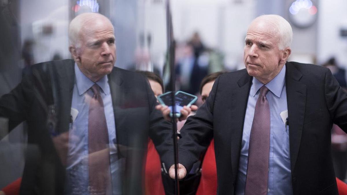 Sen. John McCain arrives in the Capitol for a vote in 2017.