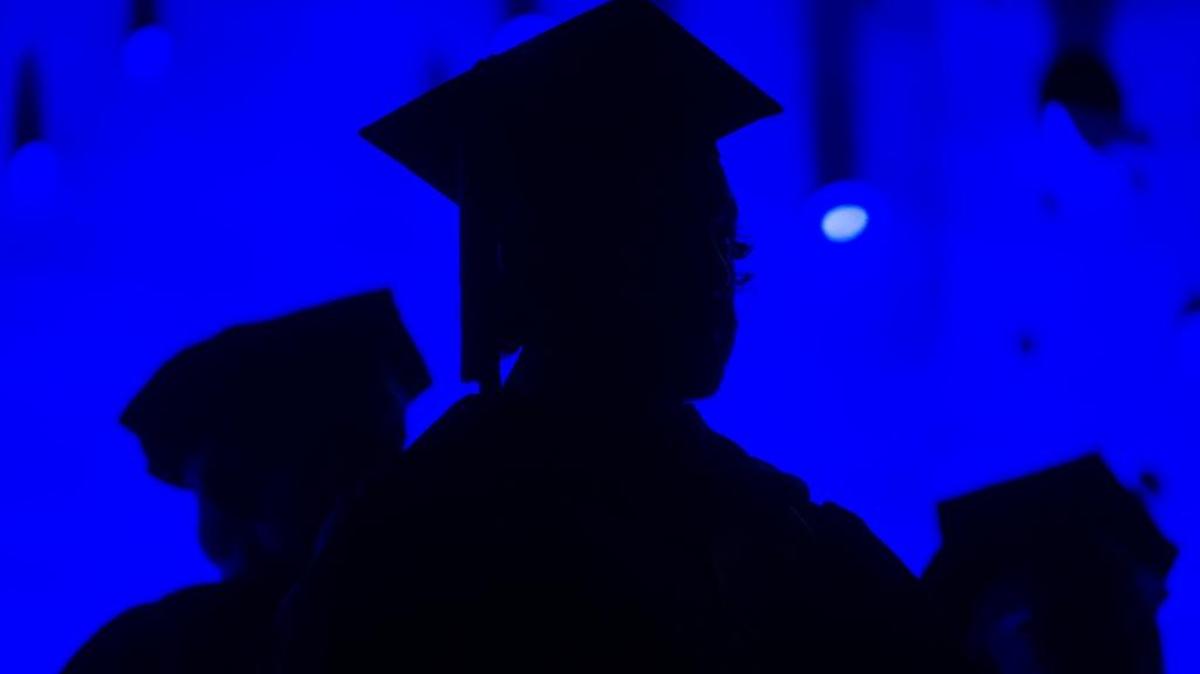 Graduates and faculty members attend the Savannah College of Art and Design commencement in Atlanta in May 2014.