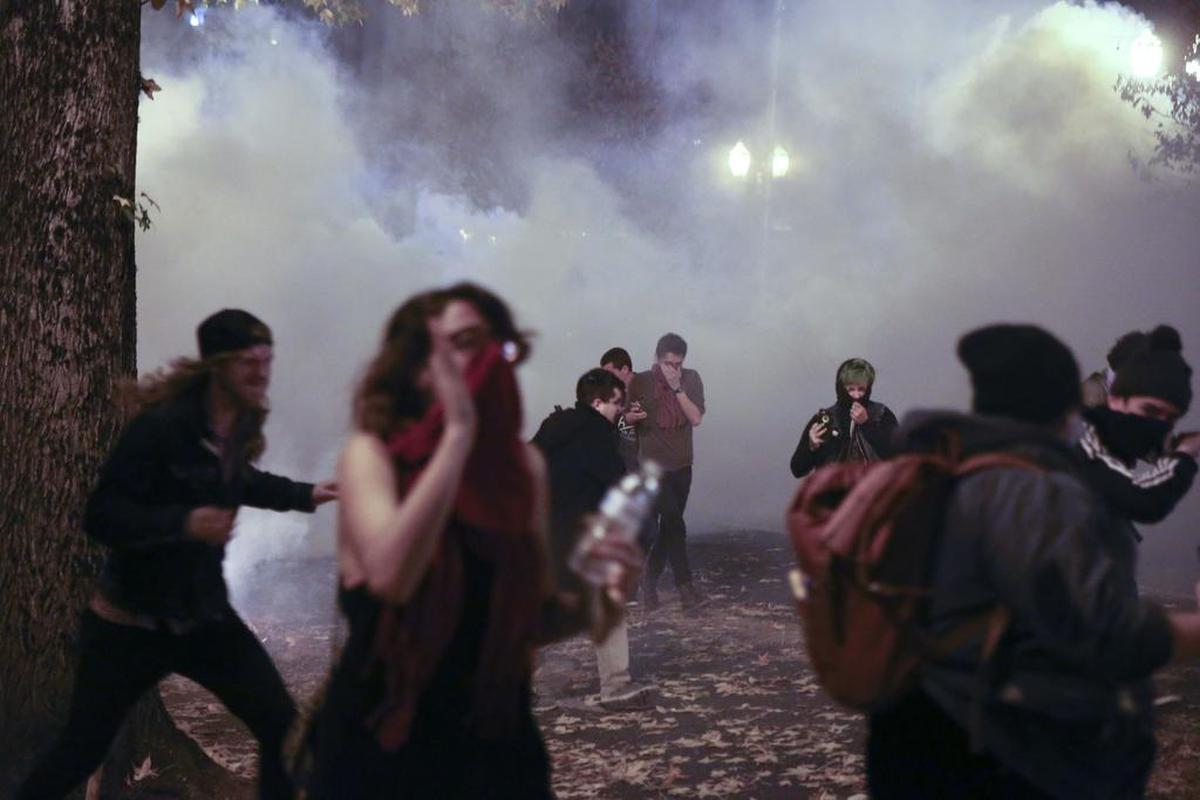 Portland has become known for protests in recent years. Here, police downtown attempt to disperse people on Nov. 11, 2016, protesting the election of Donald Trump as president.