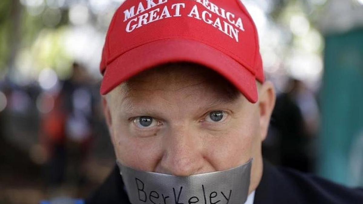 Daryl Tempesta tapes a sign over his mouth in protest during an April demonstration in Berkeley, Calif., surrounding the Ann Coulter tempest.