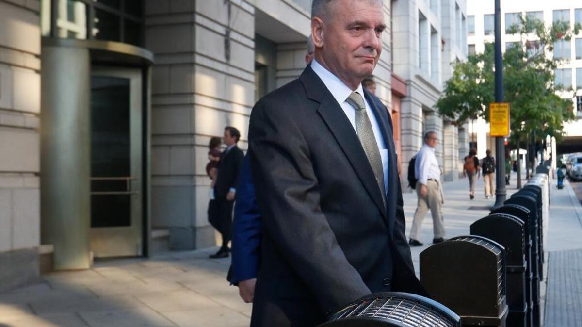 Retired Marine Gen. James Cartwright leaves US District Court in Washington, Monday, Oct. 17, 2016. Cartwright has been charged with making false statements during a federal investigation into leak of classified information contained in a book by New York Times journalist David Sanger, according to charging documents unsealed by prosecutors. (AP)