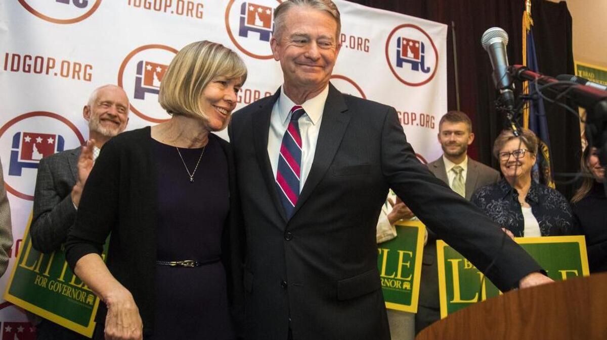 Idaho Gov.-elect Brad Little stands with his wife, Teresa, as fellow Republicans applaud his election victory Nov. 6 at the Riverside Inn in Garden City.