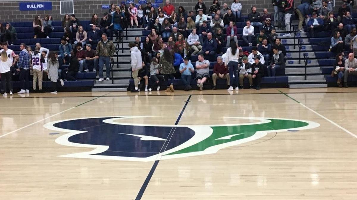 The father of a Mountain View girls basketball player threw his coat onto the court and hit an official at a Mavericks game Dec. 1, according to Meridian Police.