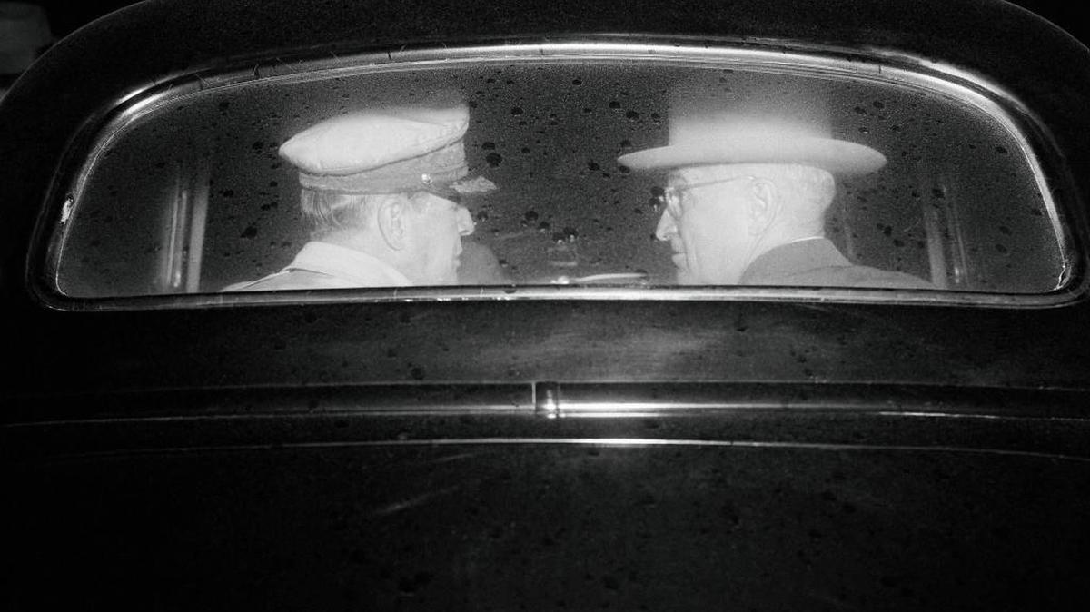 This Oct. 14, 1950, file picture shows Gen. Douglas MacArthur, left, and President Harry Truman in an automobile during a meeting on Wake Island to discuss the Korean War. Truman later told reporters the atomic bombing of North Korea was under consideration.