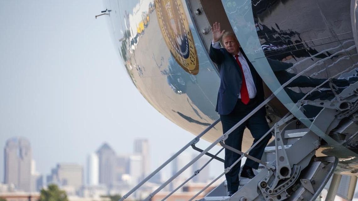 President Donald Trump waves as he boards Air Force One to depart Dallas Love Field airport Thursday in Dallas