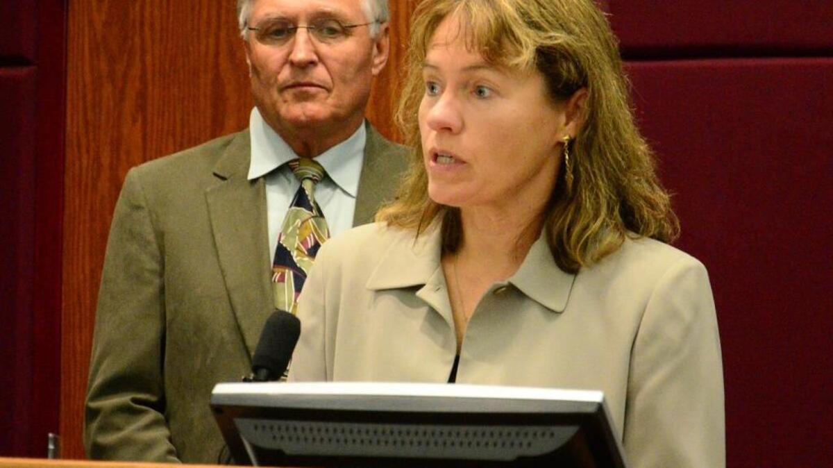 Dr. Christine Hahn talks to reporters about Ebola at a 2014 press conference. Behind her is Richard Armstrong, director of the Idaho Department of Health and Welfare. Hahn speaks Thursday to Boise’s City Club.