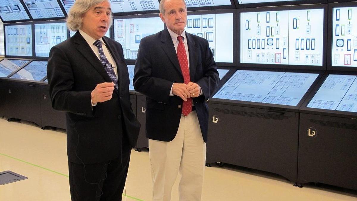 U.S. Energy Secretary Ernest Moniz, left, and U.S. Sen. Jim Risch, R-Idaho, talk about Idaho’s nuclear research efforts at the Idaho National Laboratory.