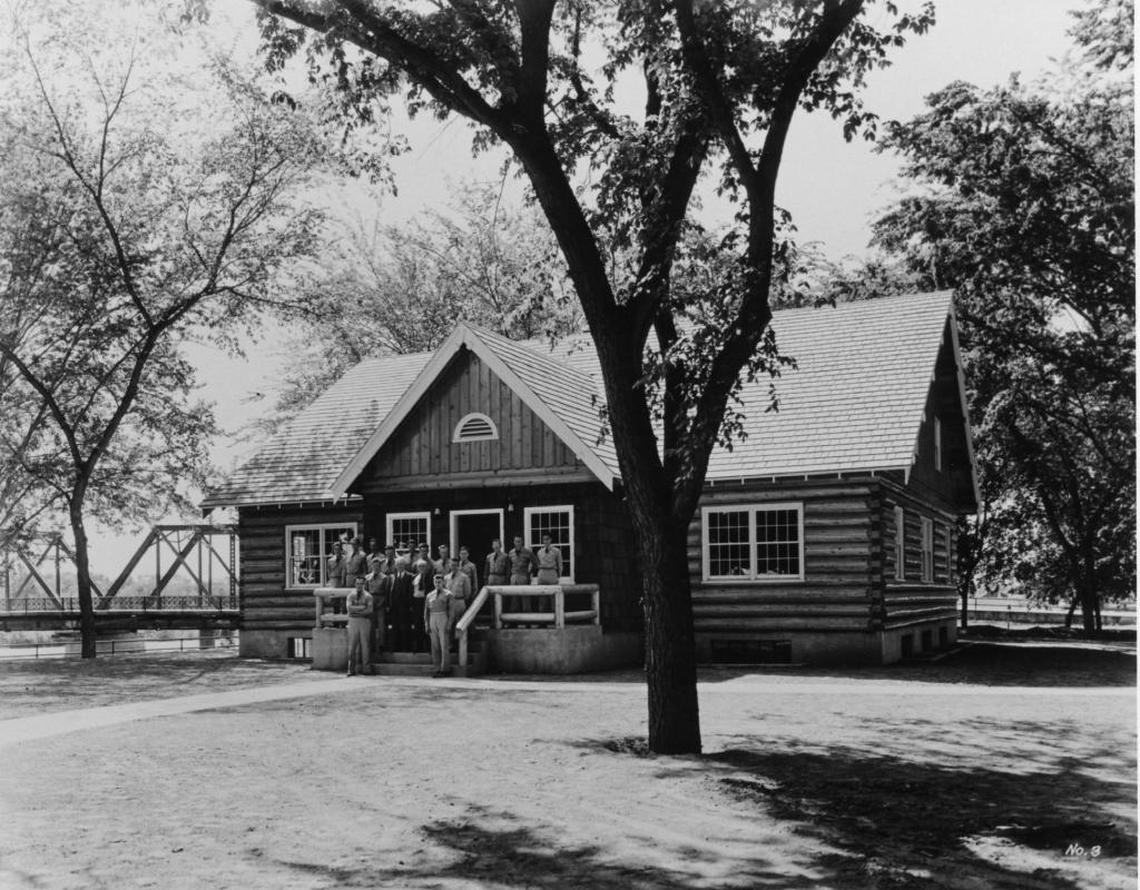 The Cabin was first used by the Forest Service when it was built it 1940. Members of the Forest Service can be seen standing in center in this archived photograph.