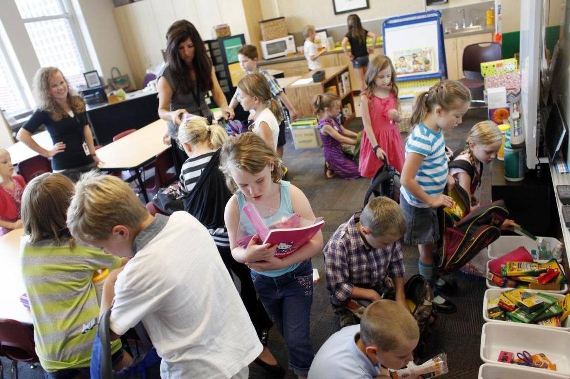 Second-graders at Boise’s Roosevelt Elementary organize supplies on the first day of school in 2012.