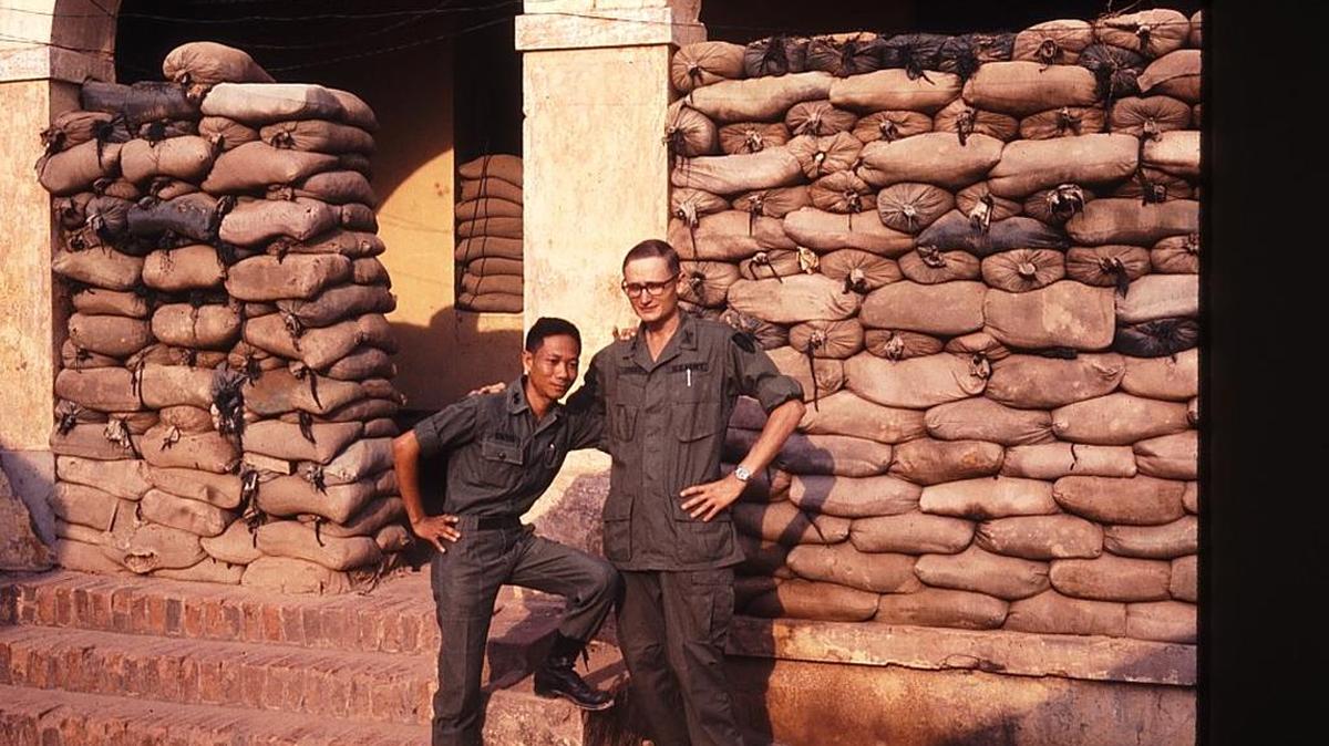 Jim Jones with a South Vietnamese Army officer in Tay Ninh City in the late 1960s.