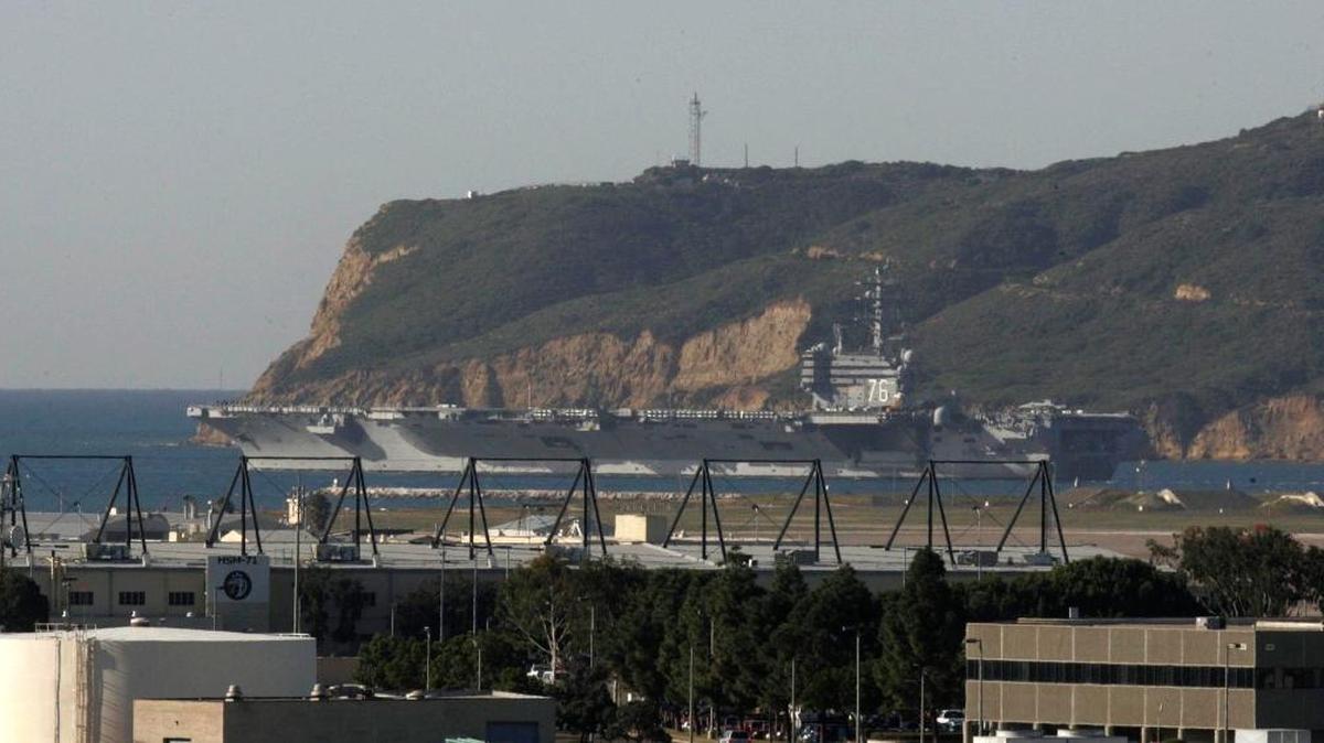 The aircraft carrier USS Ronald Reagan leaves San Diego for a deployment to the Western Pacific in 2011.