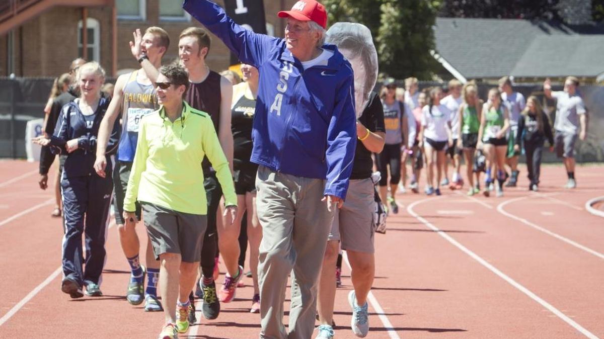 Olympian Dick Fosbury with high shool athletes at the 5A/4A state track and field meet at Boise’s Dona Larsen Park in May 2017. Fosbury lives in Bellevue.