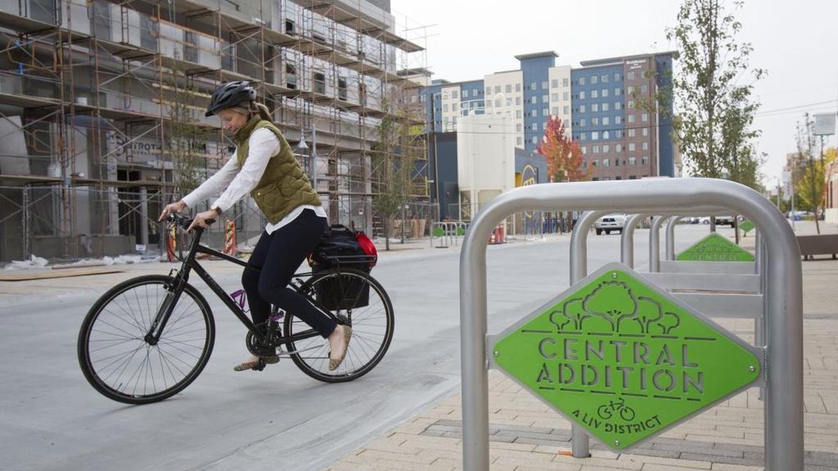 Boise’s new Central Addition LIV District, built on the foundations of the old neighborhood, emphasizes sustainability, green building, pedestrian and bike spaces. Maureen Braley, with the state bar, finishes up a meeting at the Concordia University School of Law in the district last fall.