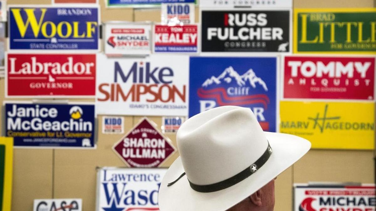 Candidate signs dominate the walls May 15 at the Republican primary election night party at the Riverside Hotel in Boise.
