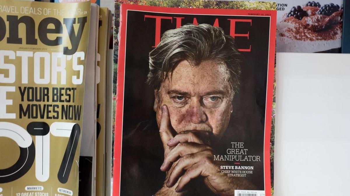 Time magazine on a New York newsstand earlier this month. Magazine and broadcasting company Meredith is buying magazine publisher Time for about $1.8 billion, with help from the billionaire Koch brothers.