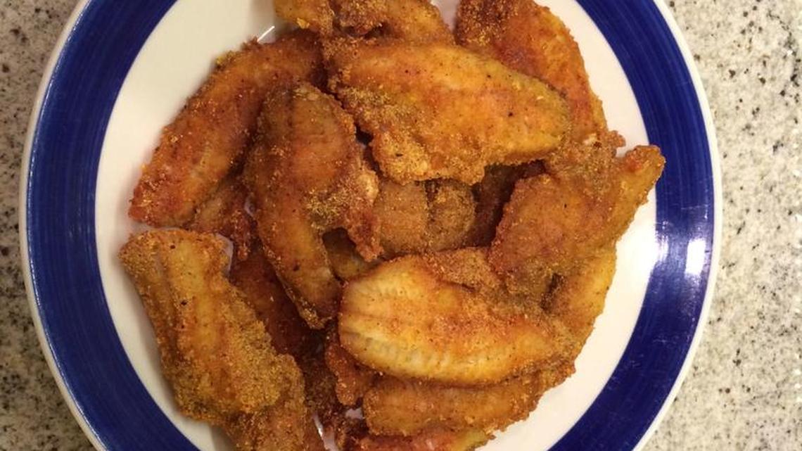A tasty, golden-brown batch of Louisiana Fish Fry-battered perch.