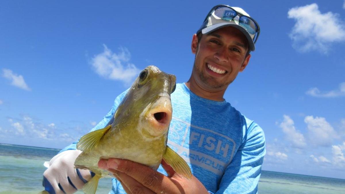 Whether using a plastic bottle or a traditional rod and reel, you can catch some cool fish in Belize.