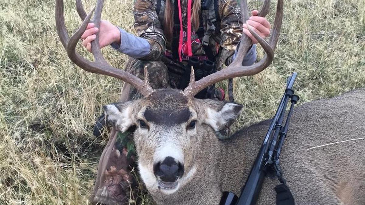Demeny May of Boise with her first mule deer buck taken on Oct. 31, the last day of the season.