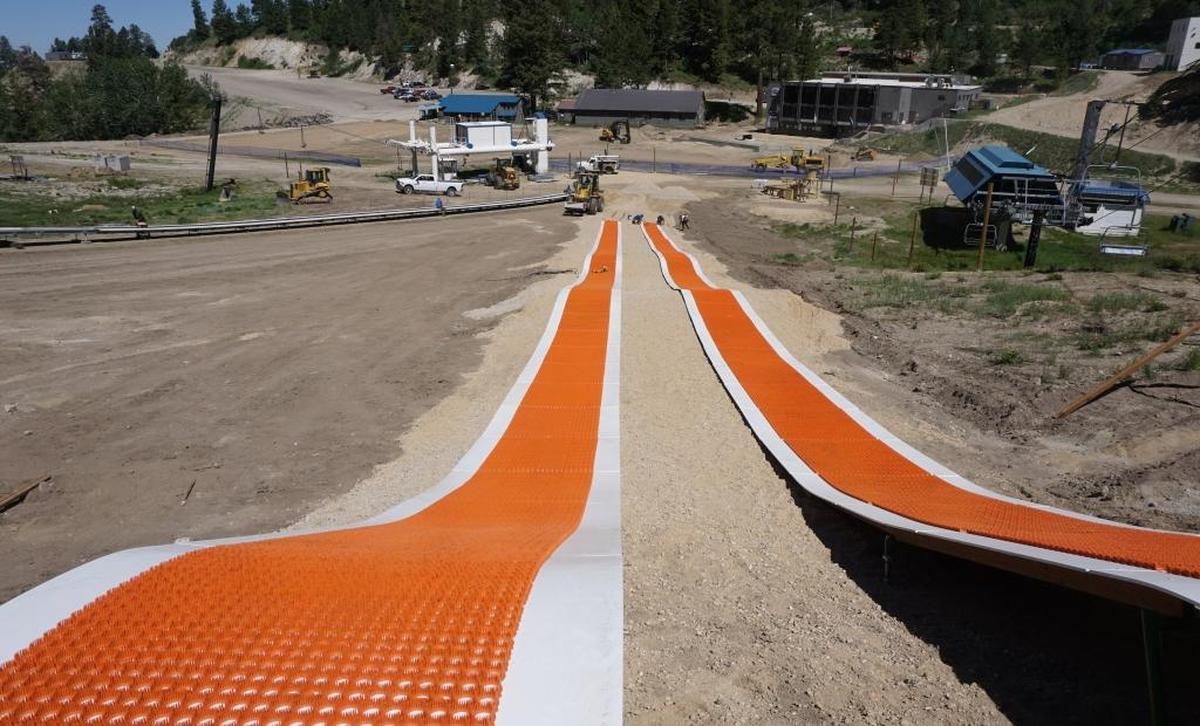 The two 300-foot tubing lanes run side by side, creating a racing opportunity. Not pictured: inflatable bumpers that keep the tubes on course.