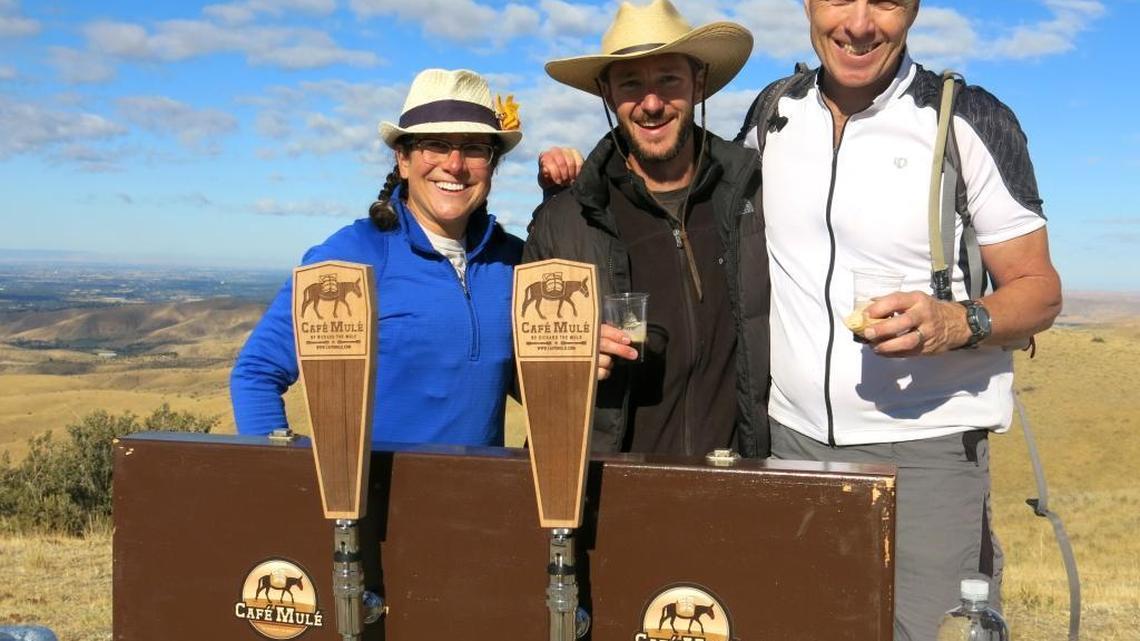 Café Mulé owner Matt Bishop, center, draws about 100 customers to his trailside coffee service when he’s working in the Boise Foothills. He’ll make his first appearance of 2017 on Saturday.