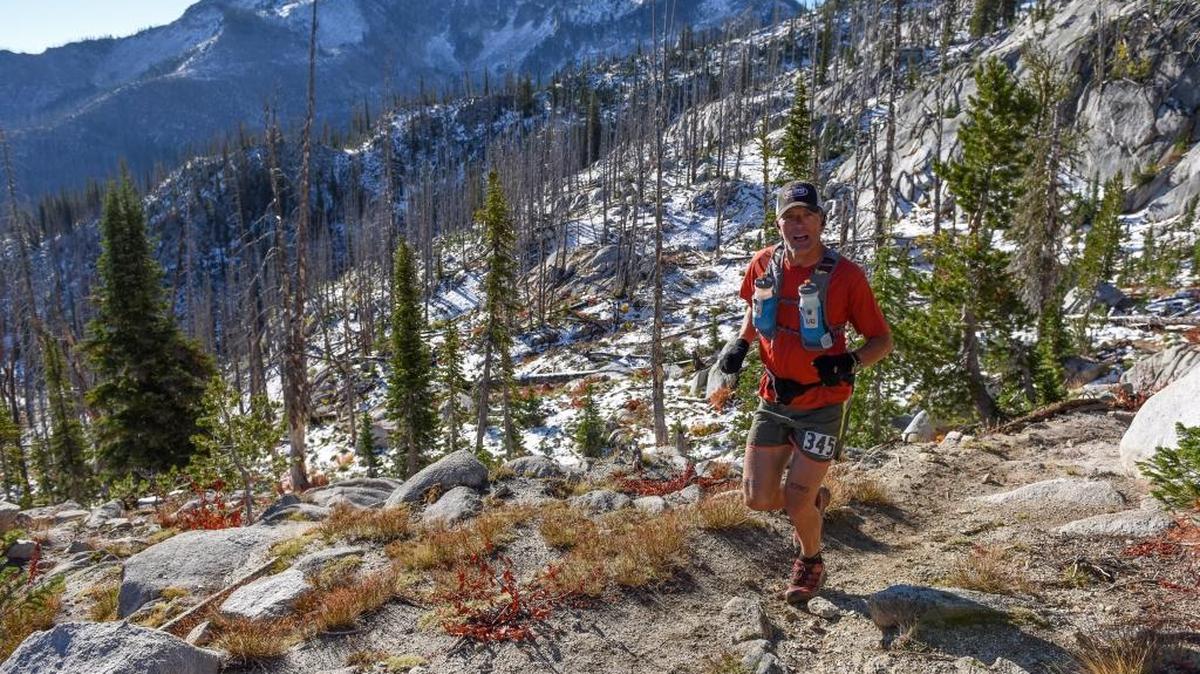 Kelly Lance of Pocatello climbs Diamond Rock near mile-marker 27 during the 2015 IMTUF 100 race.