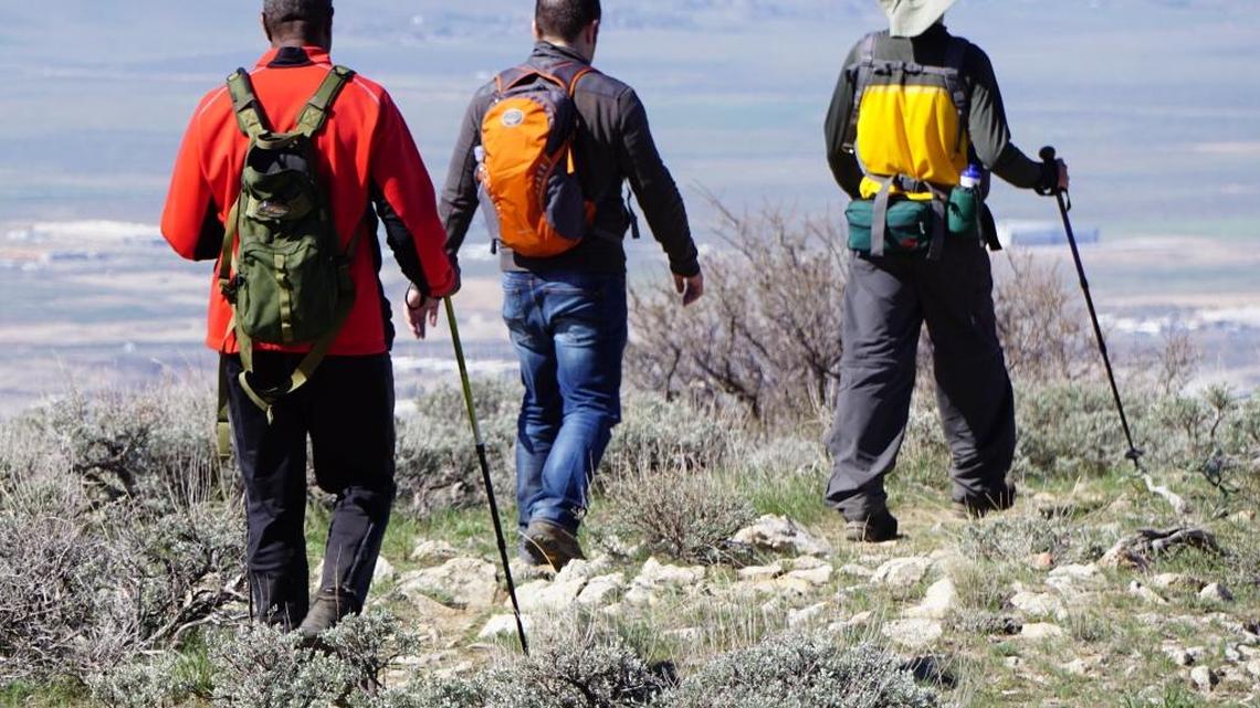 Hikers begin the descent from Lucky Peak to Boise — 3,000 feet below.