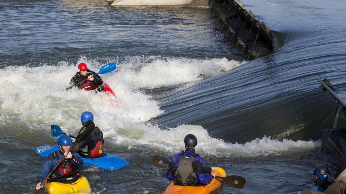Kayakers ride rapids generated at the Boise River Park in 2015.