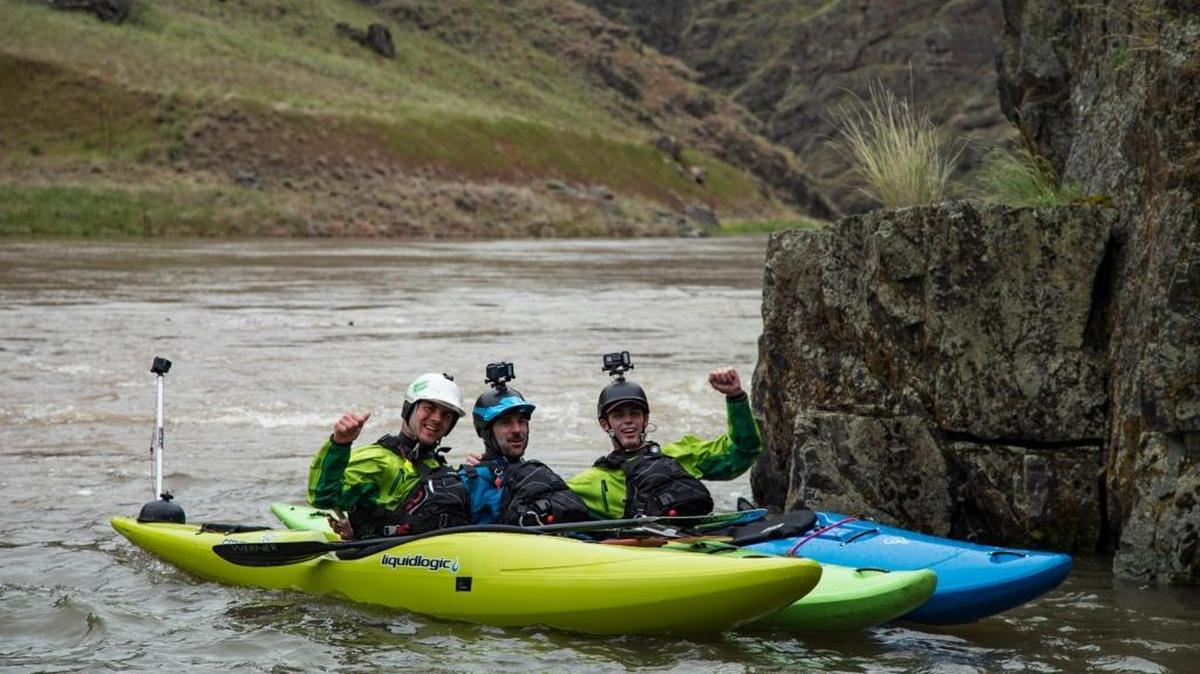 Idahoans (from left to right) Kyle Smith, Mike Bond and Sam Wells celebrate their arrival at the confluence of the Salmon and Snake rivers.