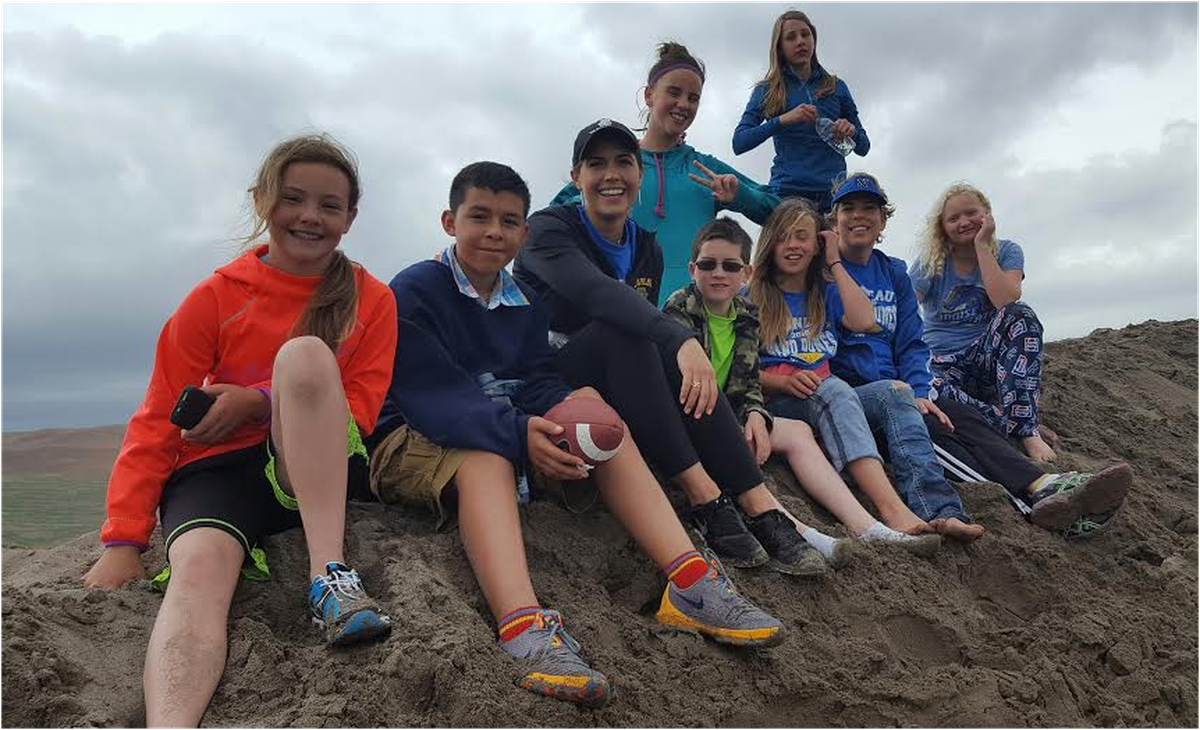 Notus sixth-graders took an overnight trip to the Bruneau Sand Dunes last month. They had a blast. From left: Cierra, Julian, Mrs. Hill, Nathan, Savannah, Ms. Golden, Gabbie. Top in blue: Kaylee, Jamie.