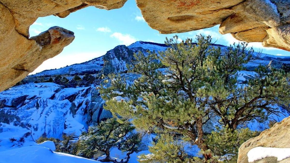 Stop at the City of Rocks visitor center — open 8 a.m. to 4:30 p.m. Tuesdays through Saturdays — where rangers can point you to the best spots for photography based on current conditions. Winter snow transforms the reserve’s vistas, like this one of Window Arch.