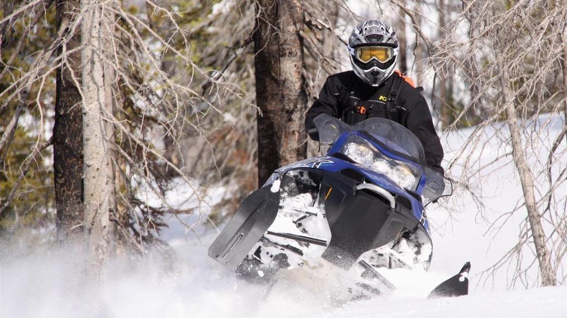 The Idaho State Snowmobile Association has opened up three trails across land now owned by two Texas billionaires in Valley and Adams counties, allowing riders to reach public land.