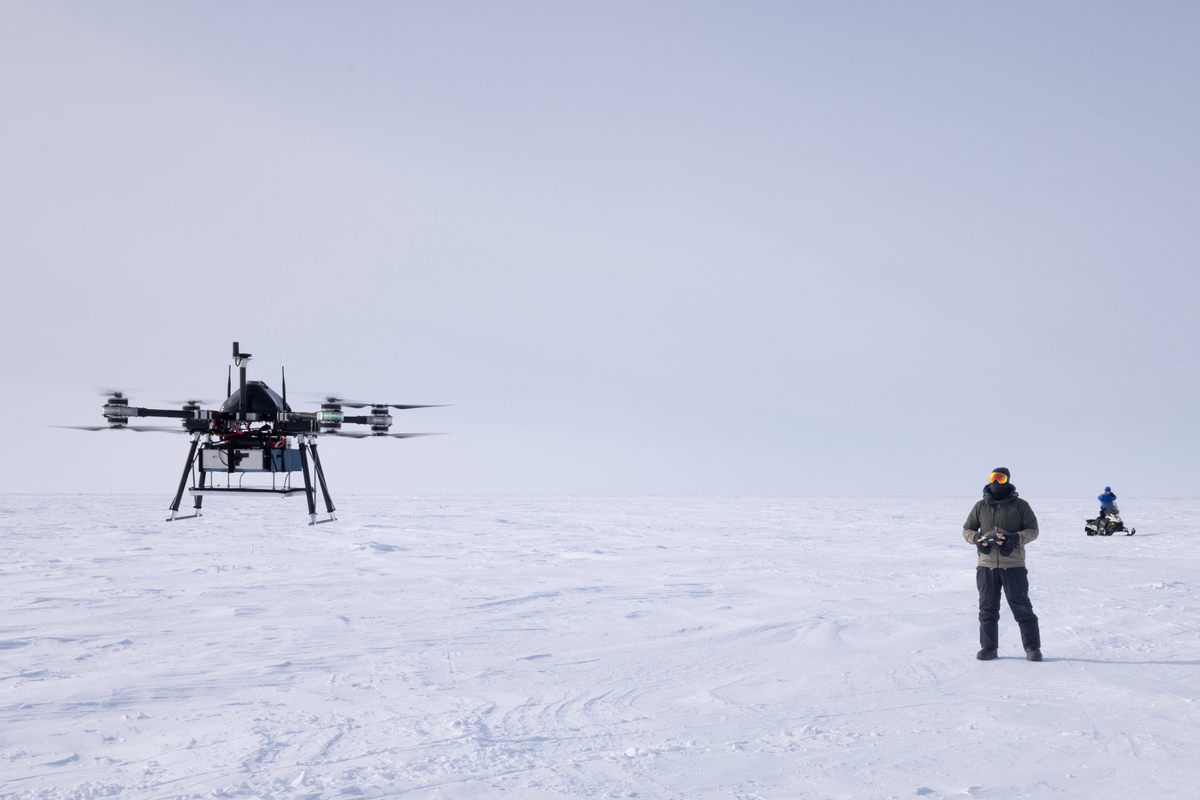 A Boise State University graduate student, Thomas Van Der Weide, pilots a drone near a sea ice camp near Utqiagvik, Alaska, in April as part of research by Boise State University and University of Alaska Fairbanks to study ice depth in the Arctic.