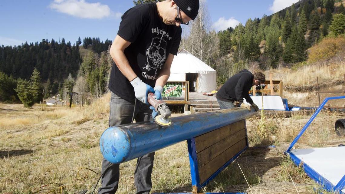 Corey McDonald, left, terrain park manager at Bogus Basin, and Preston Woods, right, terrain park director, buff a flat rail. McDonald is also the head snowboard coach for the Bogus Basin Ski Education Foundation and has been a key cog in developing youth freeride talent in the Treasure Valley.