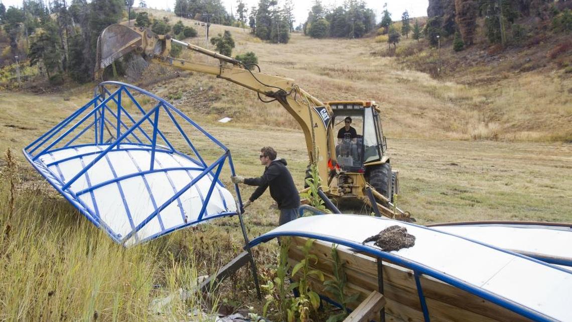 Corey McDonald (driving) and Preston Woods move terrain park equipment in preparation for the season. Mambo Meadows, behind them, is where they’ll build one of what they hope is four parks at Bogus this year, including one new one at the Bitterroot chair.