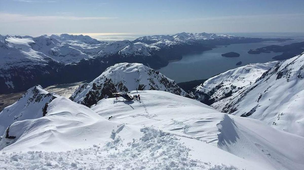 After an unfortunate five days of heavy precipitation and warm temperatures, this helicopter trip to a peak in Alaska’s Chugach Mountains was for picnicking, not skiing.