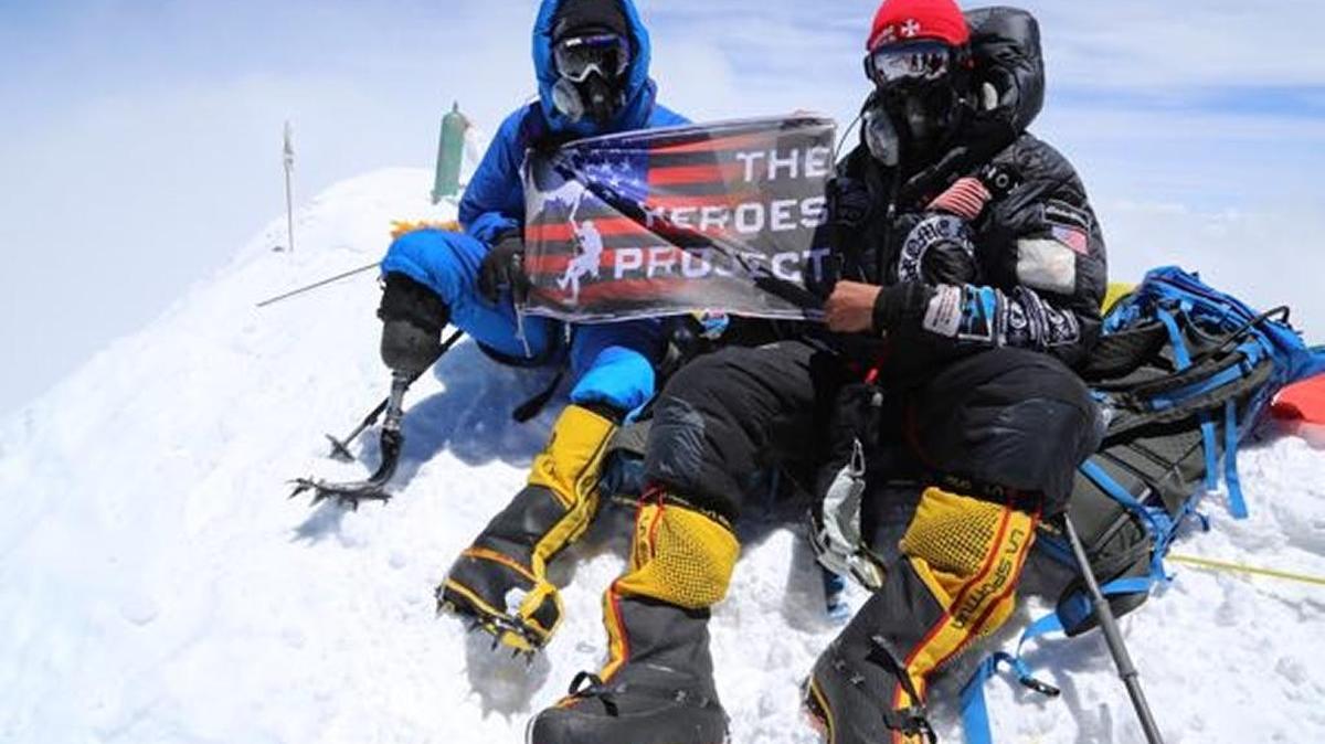 Charlie Linville, left, on the summit of Everest May 19, 2016.