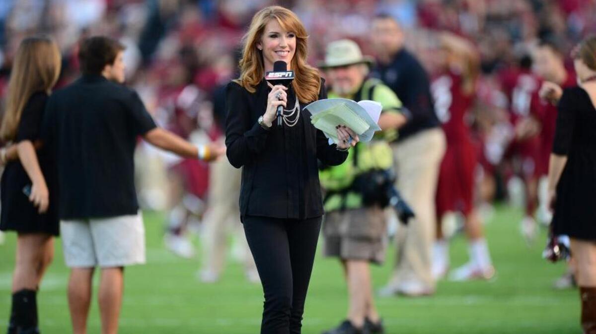 ESPN's Heather Cox during a regular season college football game during the 2012 season.
