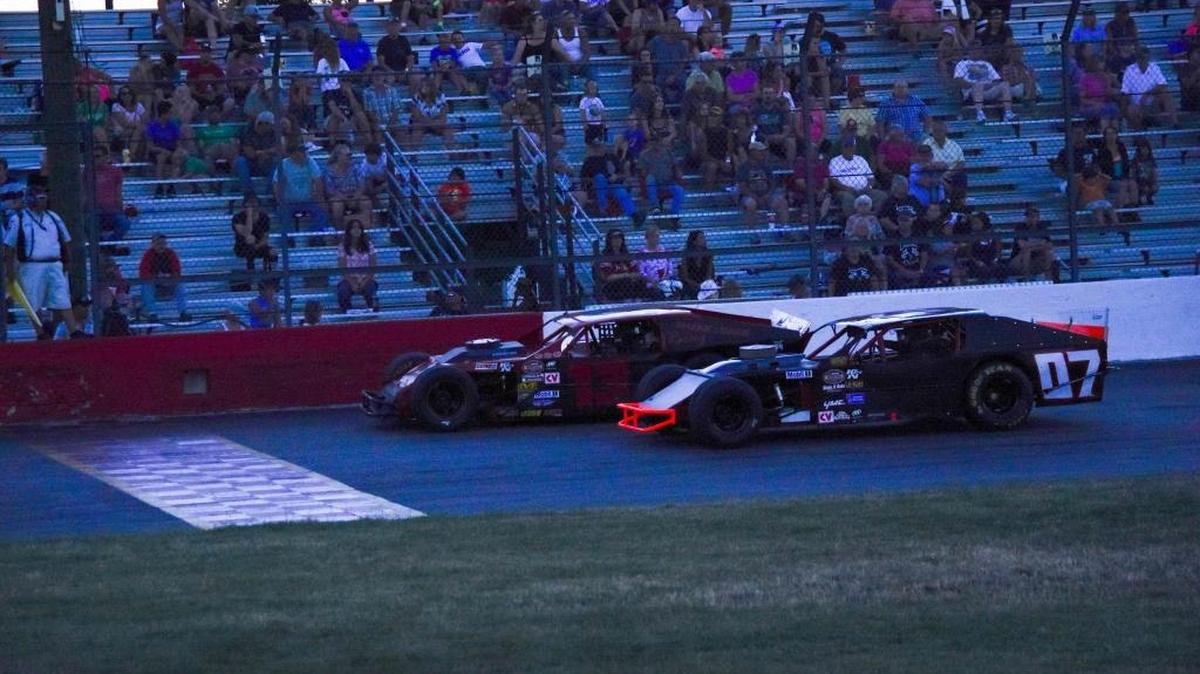 Colton Nelson (07) and Larry Hull III (13) go wheel-to-wheel for the NASCAR Whelen All-American Series Modified main event win on July 23 at Meridian Speedway. Nelson won the race, and also leads the points standings heading into Saturday’s race.